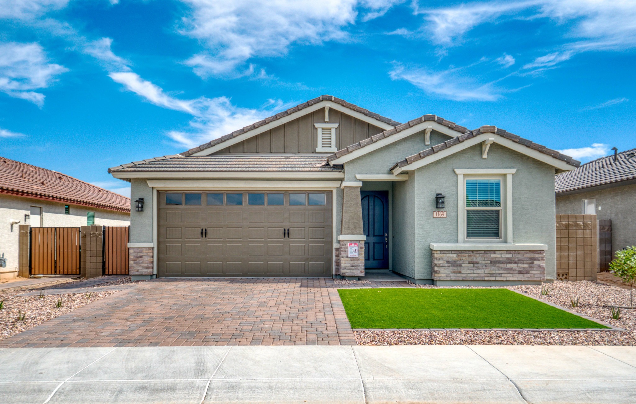Lawton home with a modern residential garage door